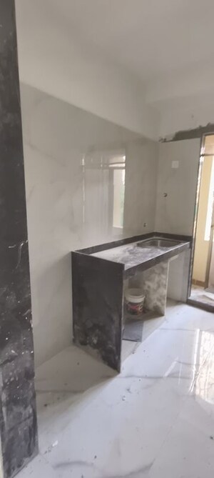 Kitchen in 1 BHK Apartment at Paradigm Zenith Pushpanjali Residency Phase III, Ghodbunder Road – for Rent
