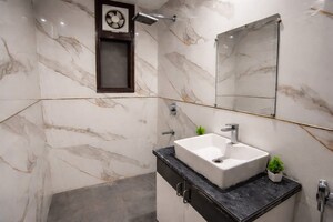 Bathroom in 3 BHK Apartment at Chattarpur – for Rent
