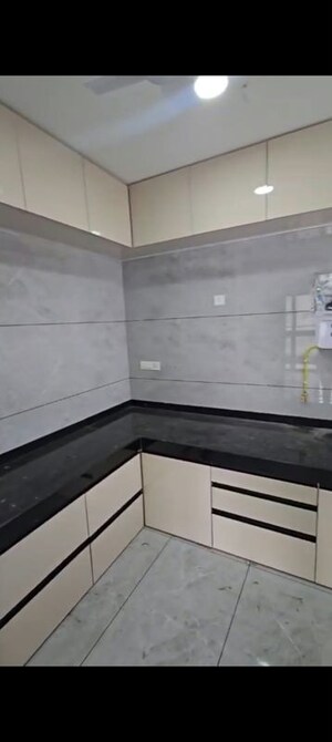 Kitchen in 3 BHK Apartment at Renuka Panchtattva, Tathawade – for Rent