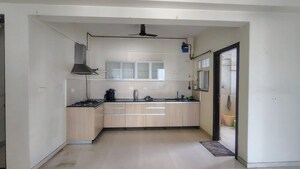 Kitchen in 2 BHK Apartment at Gera Song Of Joy, Kharadi – for Rent