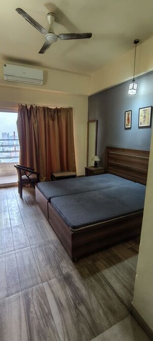 Bedroom in 1 RK Apartment at Paramount Golf Foreste Apartments, Zeta I Greater Noida – for Rent