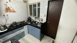 Kitchen in 2 BHK Apartment at Lifestyle Royal Oak, Wakad – for Rent