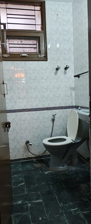 Bathroom in 3 BHK Apartment at Dwarka – for Rent
