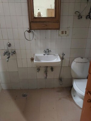 Bathroom in 3 BHK Apartment at Dwarka – for Rent