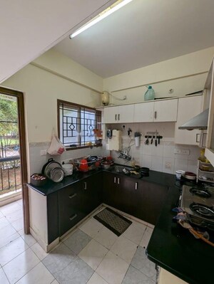 Kitchen in 2 BHK Apartment at SNN Raj Serenity, Begur Road – for Rent