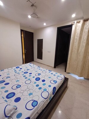 Bedroom in 4 BHK Builder Floor at Nehru Enclave – for Rent