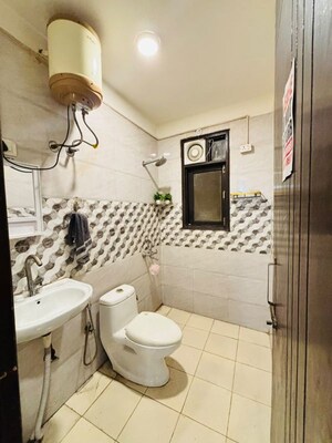 Bathroom in 2 BHK Builder Floor at Chattarpur – for Rent