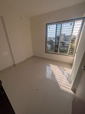 Room in 2 BHK Apartment at Chinar CHS, Kothrud – for Rent