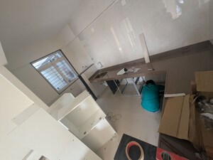Kitchen in 2 BHK Apartment at Chinar CHS, Kothrud – for Rent