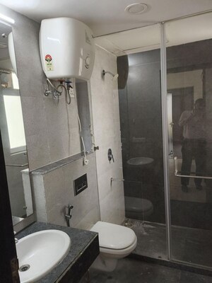Bathroom in 3.5 BHK Apartment at Microtek Greenburg, Sector 86 – for Rent