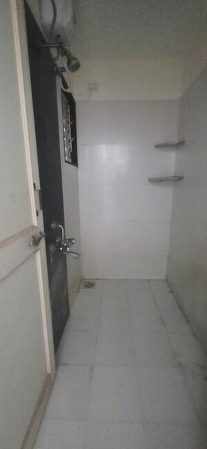 Bathroom in 1 BHK Apartment at shiv Kalp Homes, Wadgaon Sheri – for Rent