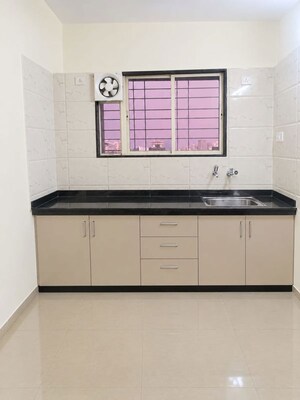 Kitchen in 1 BHK Apartment at shiv Kalp Homes, Wadgaon Sheri – for Rent