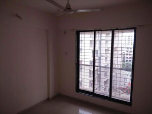 Room in 2 BHK Apartment at Kamothe Sector 11 – for Sale