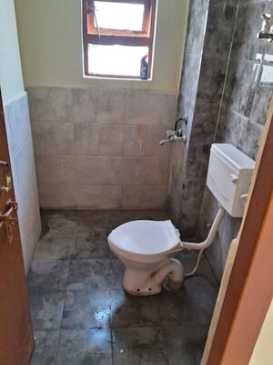 Bathroom in 1 BHK Apartment at Auric City Homes, Sector 82 – for Rent