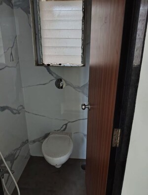 Bathroom in 1 BHK Apartment at Raunak Bliss B1, Ghodbunder Road – for Rent