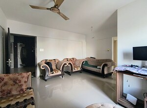 Living Room in 1 BHK Apartment at Malkani Bella Vita, Wagholi – for Rent