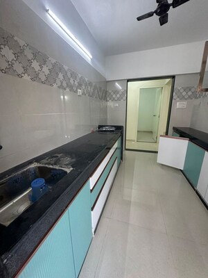Kitchen in 2 BHK Apartment at Siddha Sky, Sion – for Rent