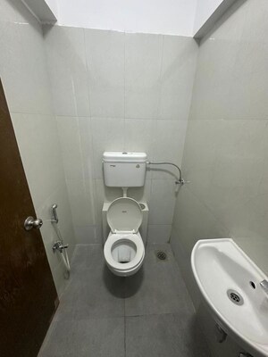 Bathroom in 2 BHK Apartment at Siddha Sky, Sion – for Rent