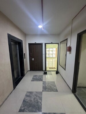 Living Room in 2 BHK Apartment at Siddha Sky, Sion – for Rent
