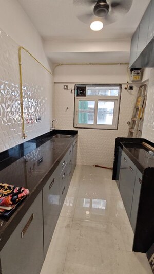 Kitchen in 2 BHK Apartment at Omkar Vive, Kurla – for Rent