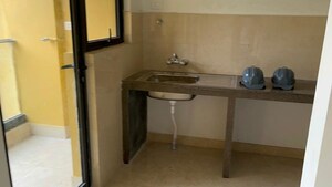 Kitchen in 2 BHK Apartment at Ambuja Urvisha The Condoville, New Town Action Area 1 – for Sale
