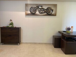Living Room in 1 BHK Apartment at Lodha Amara, Kolshet Road – for Rent