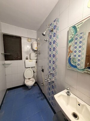 Bathroom in 2 BHK Apartment at Prathampad Apartments, Malad West – for Rent