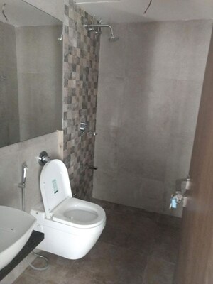 Bathroom in 2 BHK Apartment at Omkar Meridia, Kurla West – for Rent