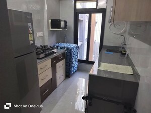 Kitchen in 1 BHK Apartment at Diamond Park, Santacruz East – for Rent