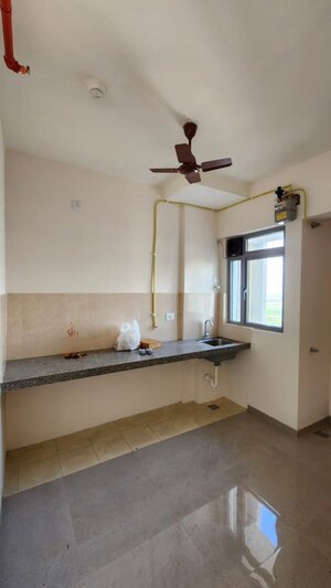 Kitchen in 1 BHK Apartment at Piramal  Vaikunth Cluster 4, Balkum Pada – for Rent