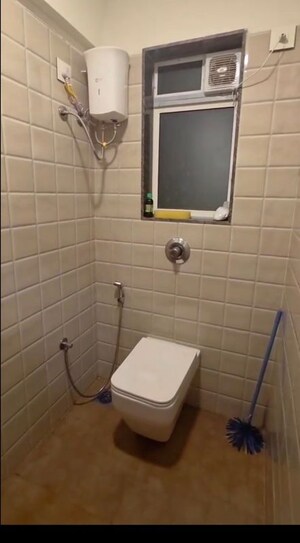 Bathroom in 1 BHK Apartment at Ashirwad Queens Square, Santacruz West – for Rent