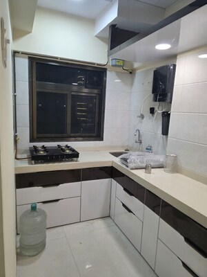 Kitchen in 1 BHK Apartment at Paranjape Schemes Royal Court, Andheri East – for Rent