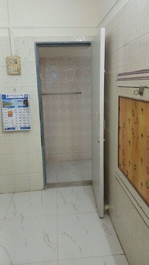 Bathroom in 1 BHK Apartment at Jalmeena CHS, Vile Parle East – for Rent