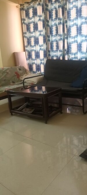 Living Room in 1 BHK Apartment at Sunshine Willows, Ghansoli – for Rent