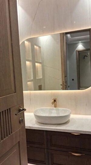 Bathroom in 4 BHK Apartment at Jor Bagh – for Rent