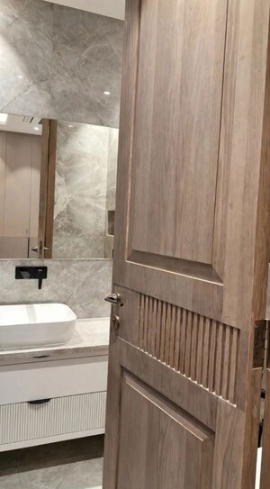 Bathroom in 4 BHK Apartment at Jor Bagh – for Rent