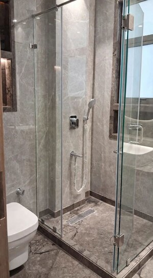 Bathroom in 4 BHK Apartment at Jor Bagh – for Rent
