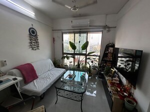 Living Room in 1 BHK Apartment at Sheth Vasant Oasis, Andheri East – for Rent