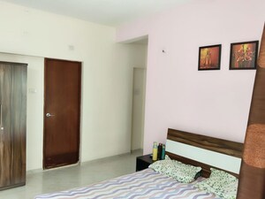 Bedroom in 2 BHK Apartment at Megapolis Sangria Towers, Hinjewadi – for Rent