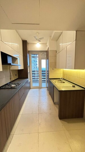 Kitchen in 3.5 BHK Apartment at Mahindra Luminare, Sector 59 – for Rent