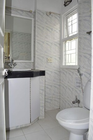 Bathroom in 3 BHK Builder Floor at Malibu Town – for Rent
