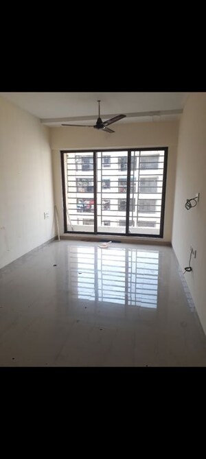 Living Room in 2 BHK Apartment at Cosmos Regency, Virar West – for Rent