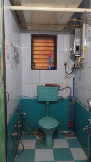 Bathroom in 3 BHK Apartment at Yashodeep CHS, Kopar Khairane – for Rent