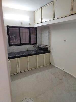 Kitchen in 2 BHK Apartment at Shivanand Garden, Wanwadi – for Rent