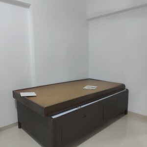 Bedroom in 1 BHK Apartment at Rajiv Sojpal Building, Dadar West – for Rent