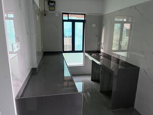 Kitchen in 1 BHK Apartment at Puneet Shivalaya, Tagore Nagar – for Rent