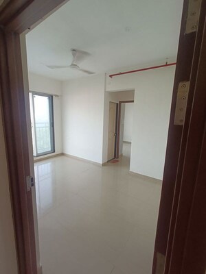 Living Room in 1 BHK Apartment at Mayfair Virar Gardens, Bolinj – for Rent