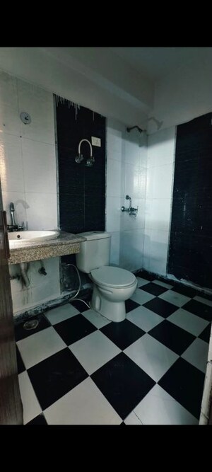 Bathroom in 2 BHK Apartment at Meenal Balmukund Residency, Raj Nagar Extension – for Sale