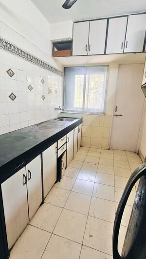 Kitchen in 1 BHK Apartment at Ramesh Hermes Heritage Phase 2, Shastrinagar – for Rent