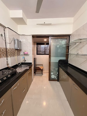 Kitchen in 2 BHK Apartment at HDIL Dheeraj Diamond, Malad West – for Rent